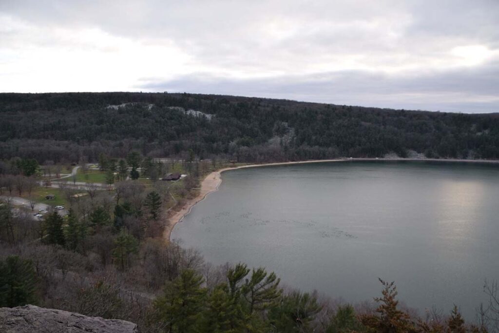 A calm Devil's Lake viewed from high atop the bluffs
