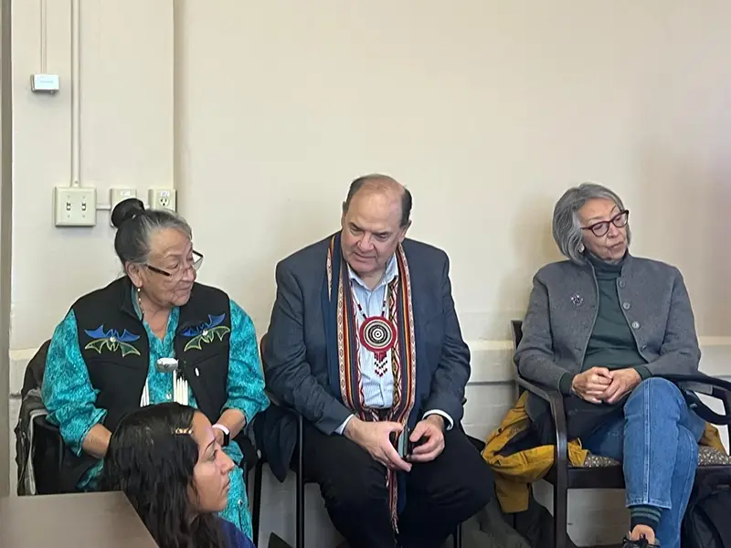 Three audience members participate in the event
